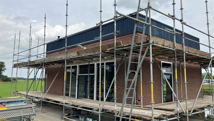 Pompgebouw De Mars in de steigers